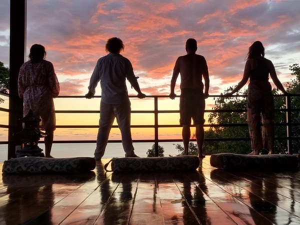 Pagoda four people looking to sunset 600x450